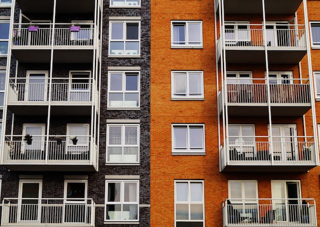 Exterior apartment building windows and balconies